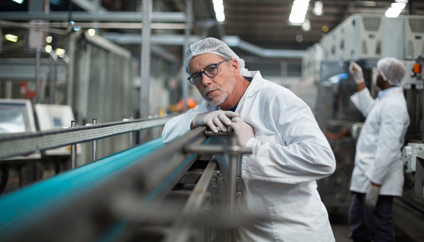 Factory engineer monitoring production line